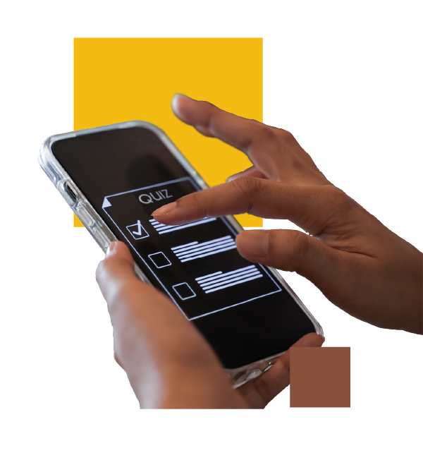 A close-up of a person’s hands interacting with a smartphone displaying an online quiz. The screen shows a digital interface with multiple-choice options, one of which is checked. The phone has a transparent protective case. The background features a modern graphic design with a yellow square behind the phone and a small brown square near the bottom right corner.