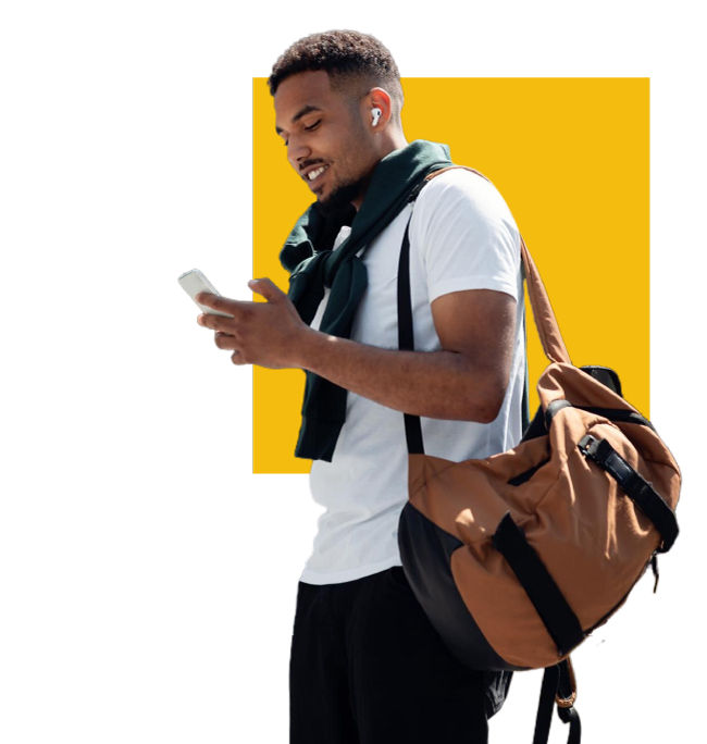 young black man holding a smartphone while smiling